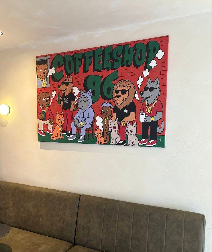 Back wall mural at Coffeeshop 96 — cartoon animal posse in matching 96 streetwear